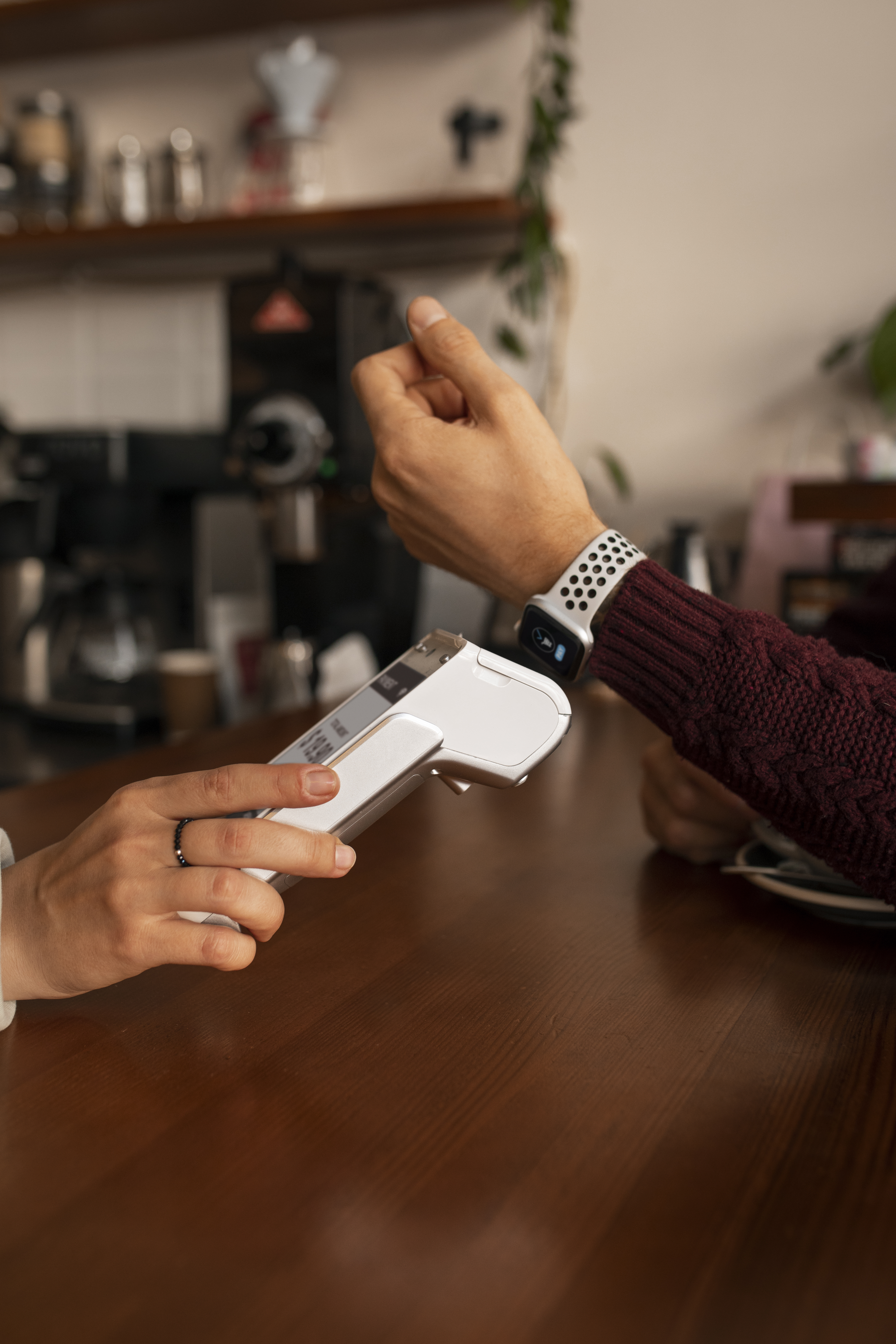 Customer paying a bill using contactless technology