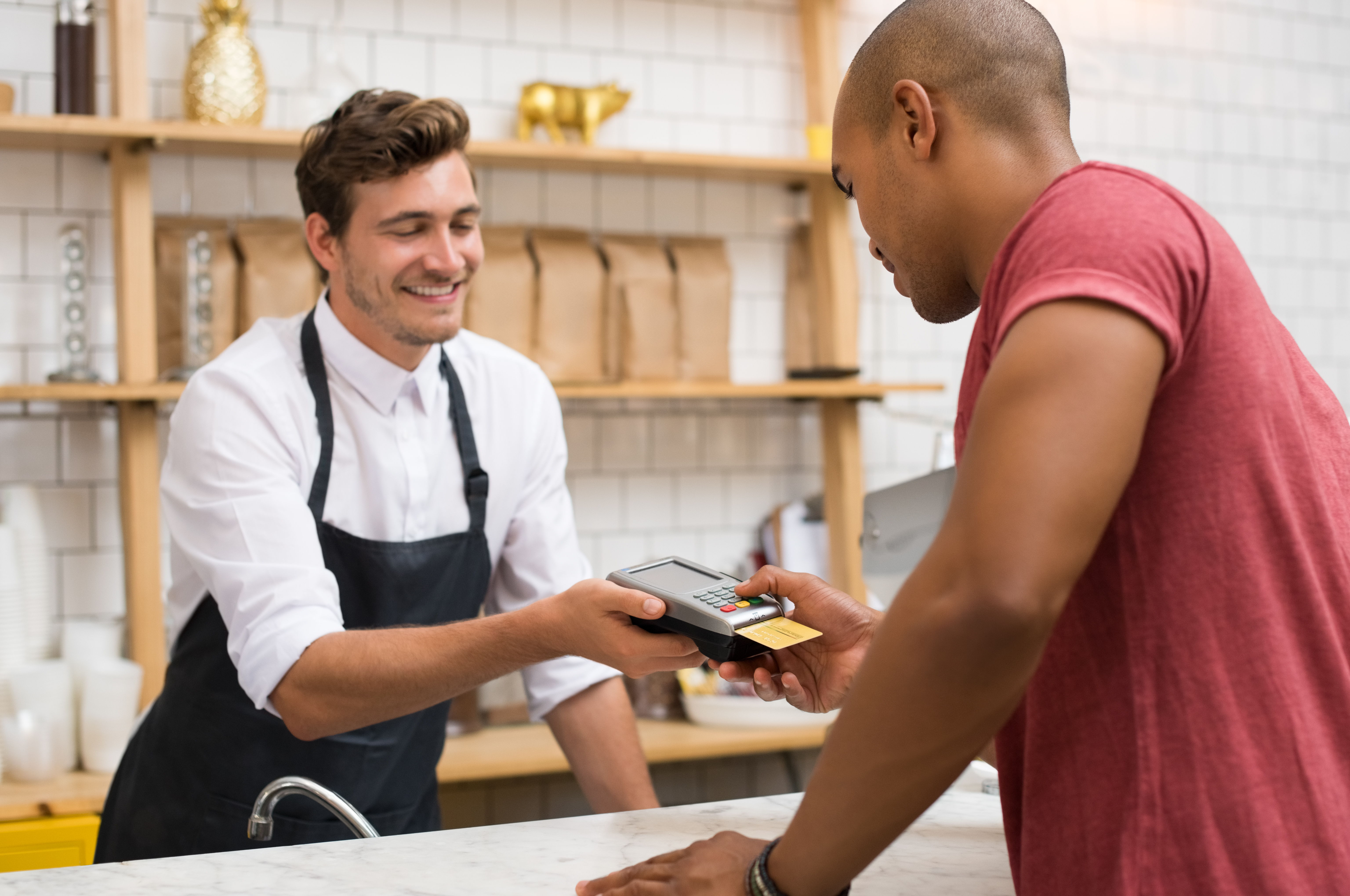 Employee verifying a card payment